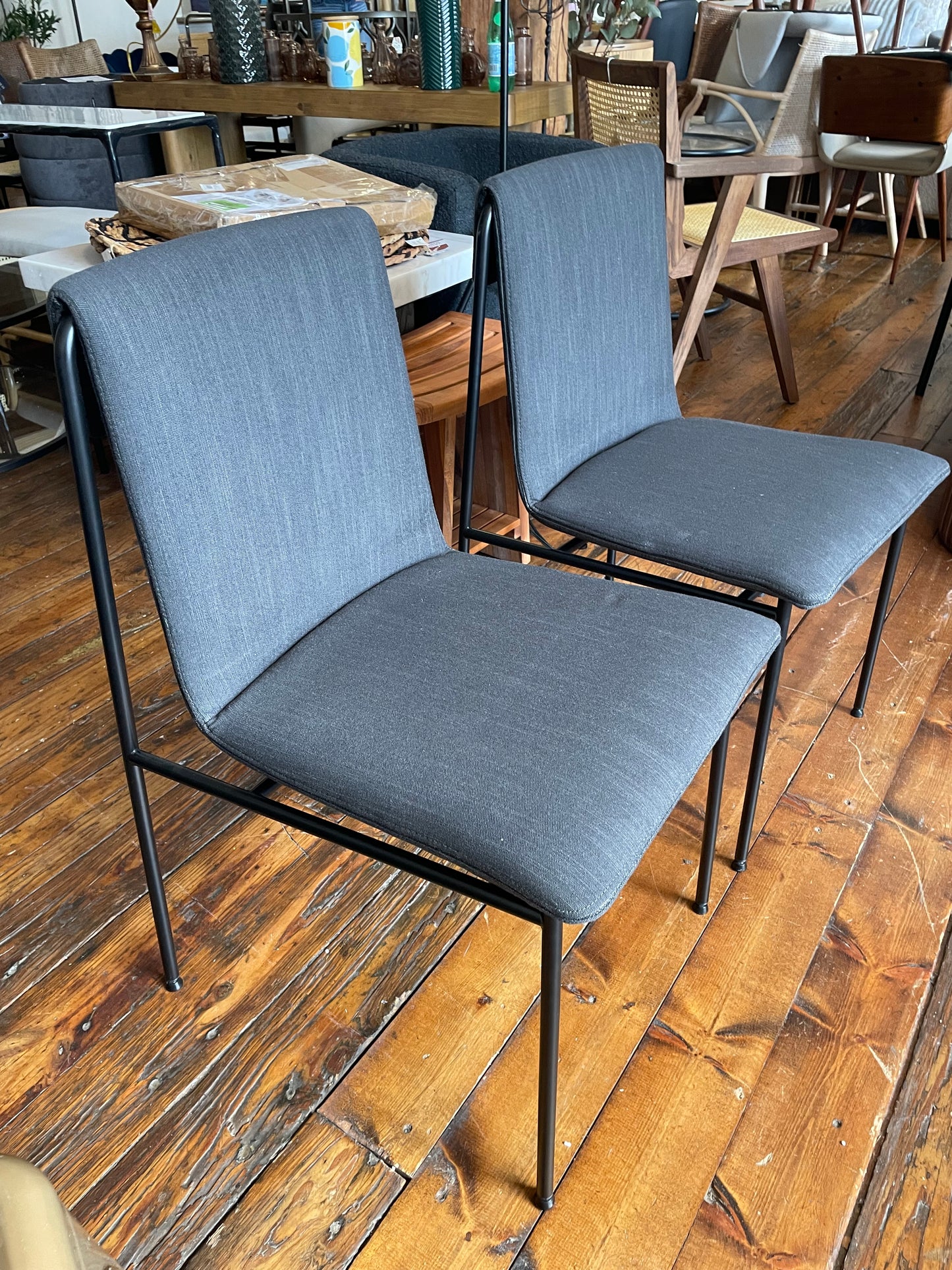 2 dark grey upholstered minimalist chairs ☕