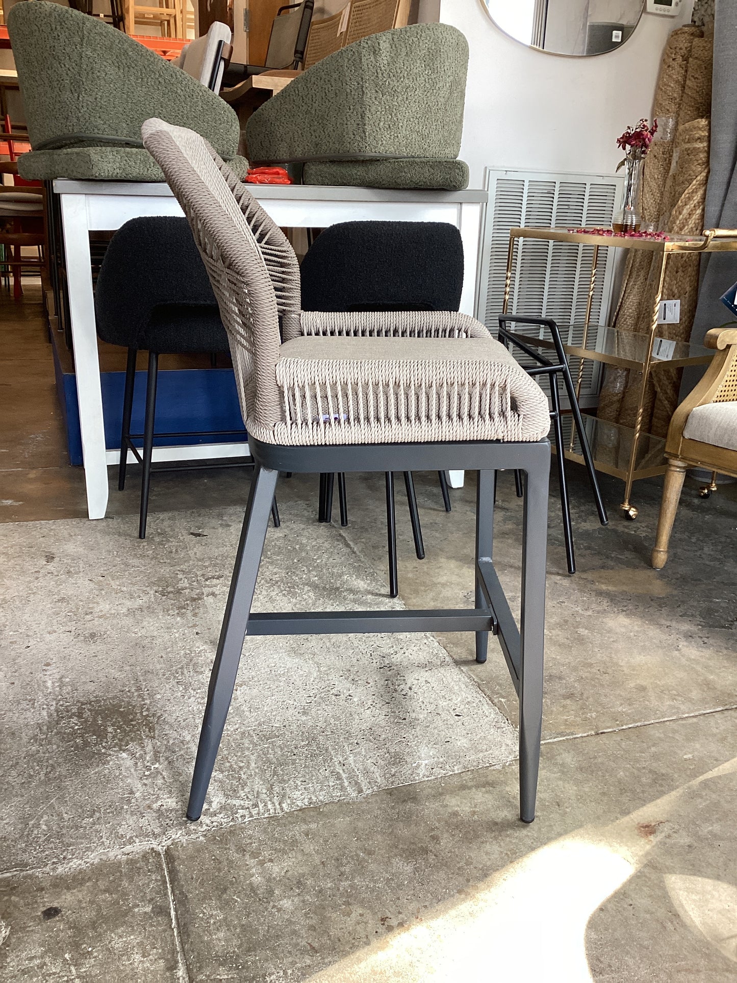 Woven back indoor/outdoor counterheight stool with metal legs 🥃