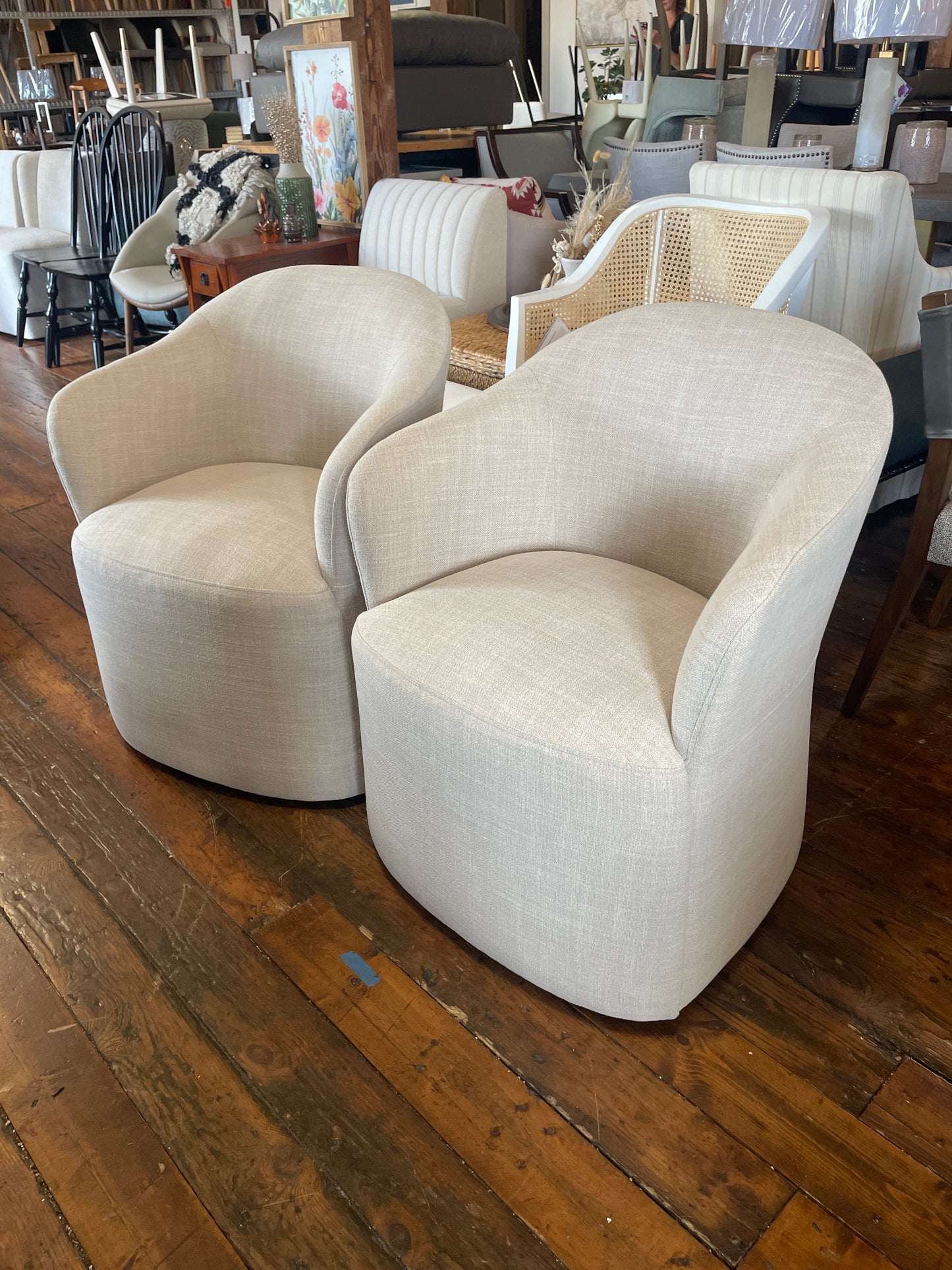 Modern linen upholstered beige chair on casters 🪴