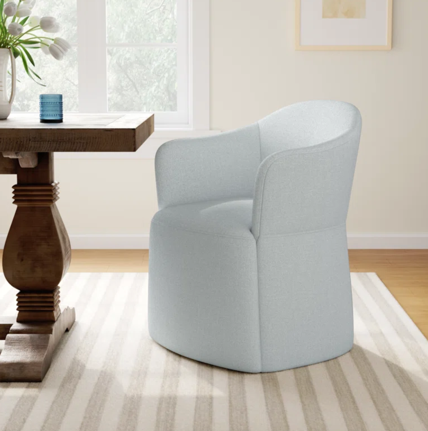Light blue upholstered armchair on casters 🌸