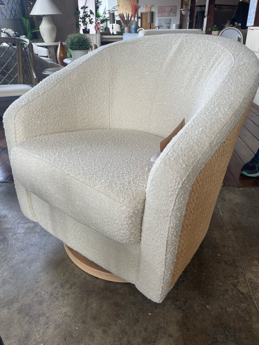 Babyletto swivel glider in ivory boucle w/ cane back & light wood base 🪴