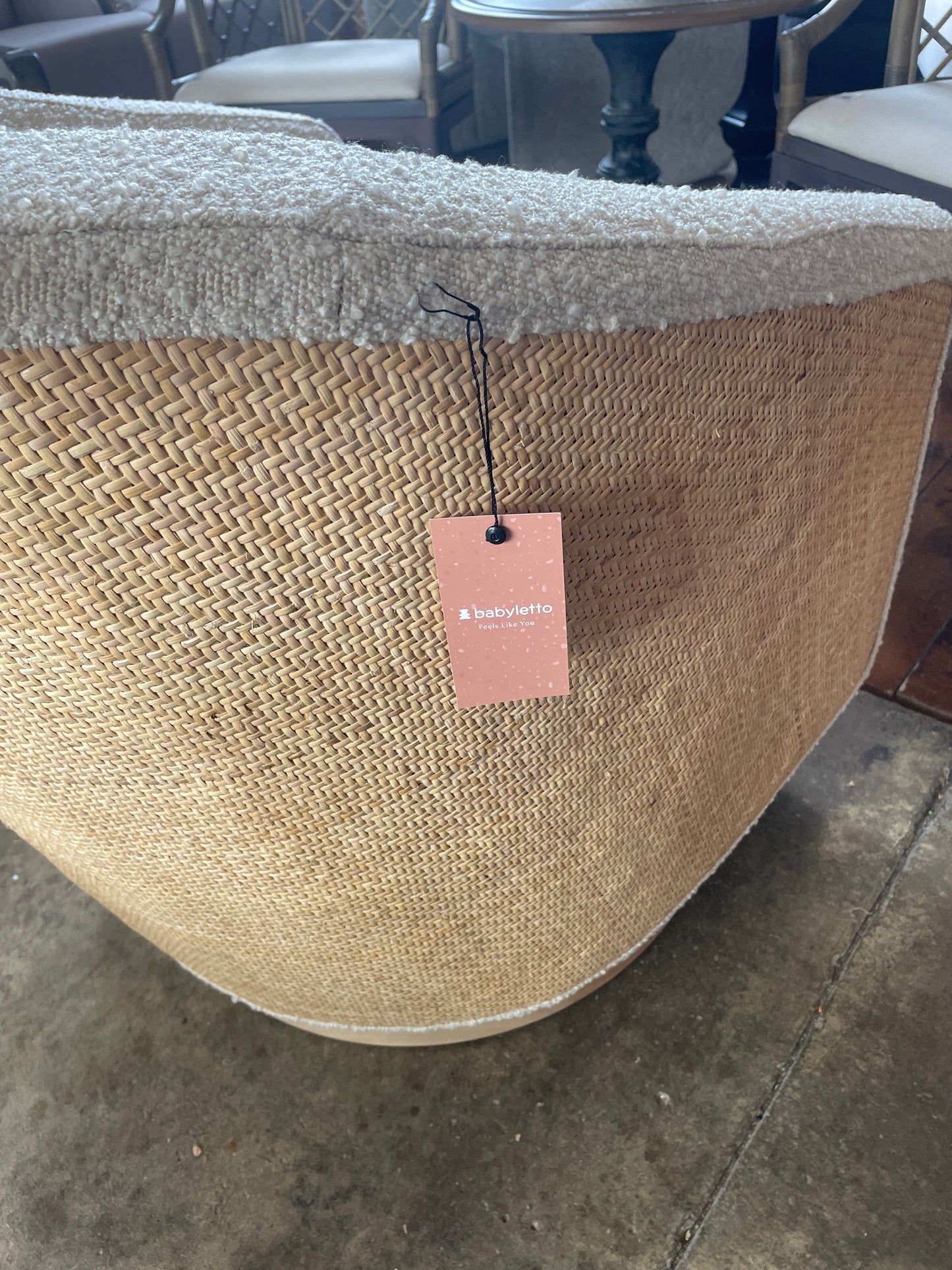 Babyletto swivel glider in ivory boucle w/ cane back & light wood base 🪴