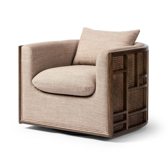 Four Hands cane & linen swivel armchair w/ pillow