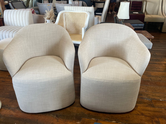 Modern linen upholstered beige chair on casters 🪴