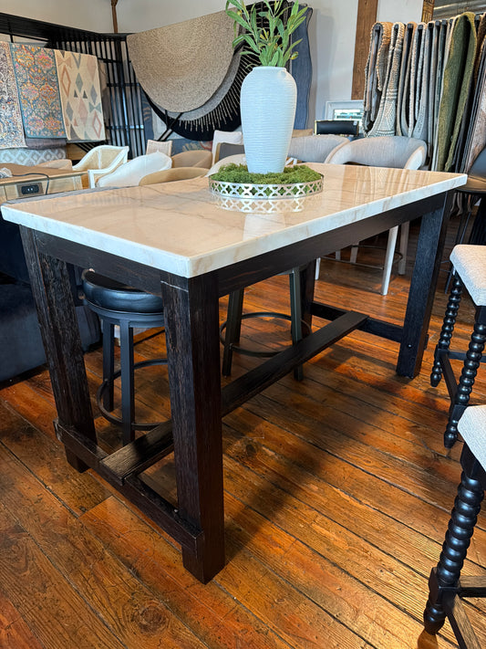Stunning white marble island w/ black wood legs 🤍