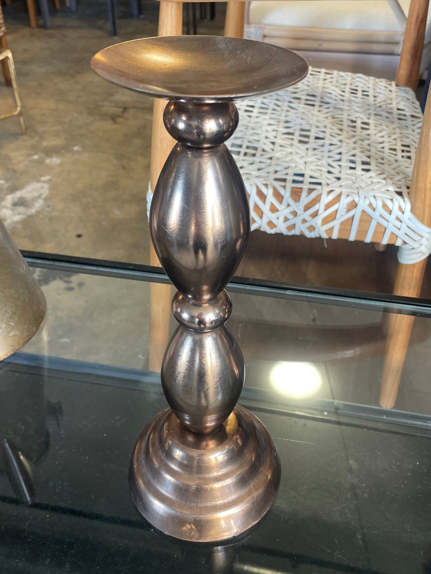 Shiny brassy candlestick 🕯️
