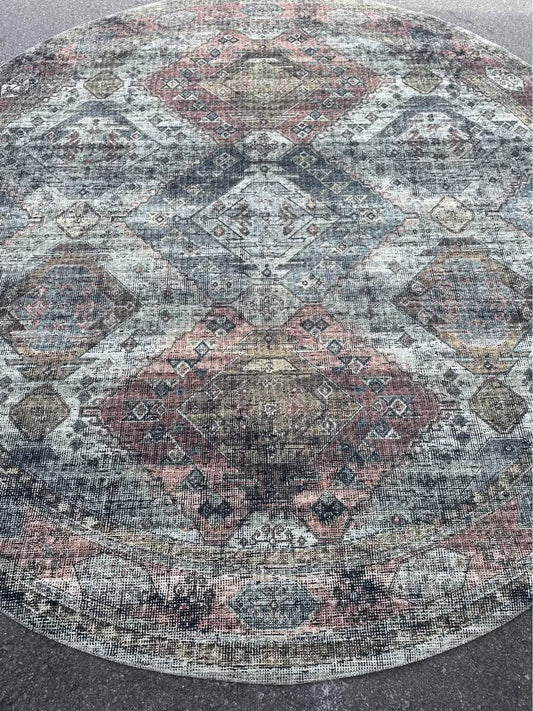 8’ round Loloi rust & green rug 🌺