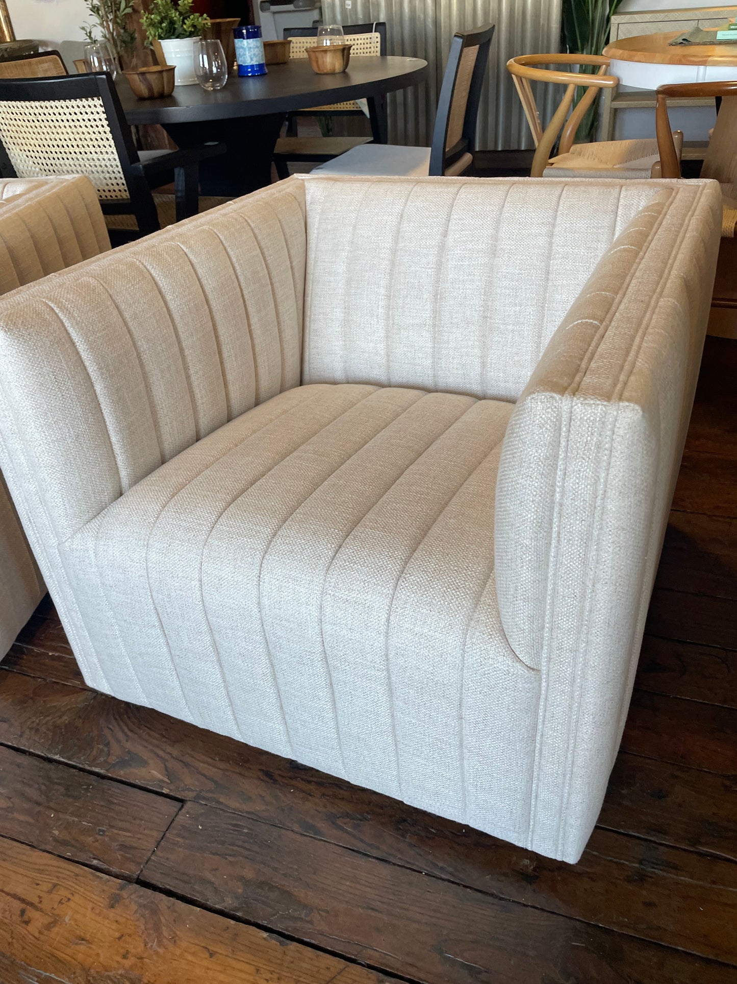 Four Hands swivel beige linen channel tufted armchair 🪴