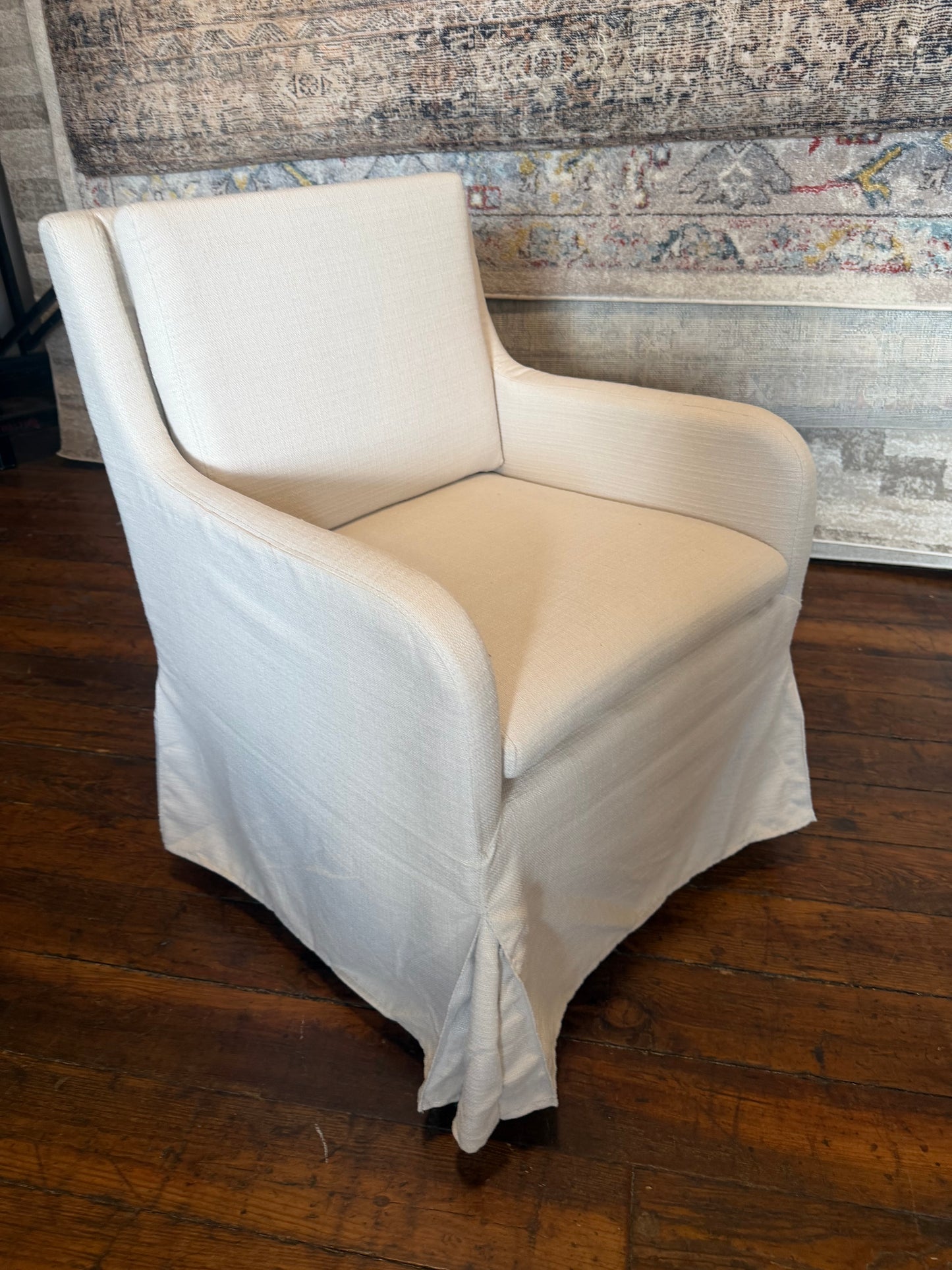 Upholstered cream linen chair on castors 🦋