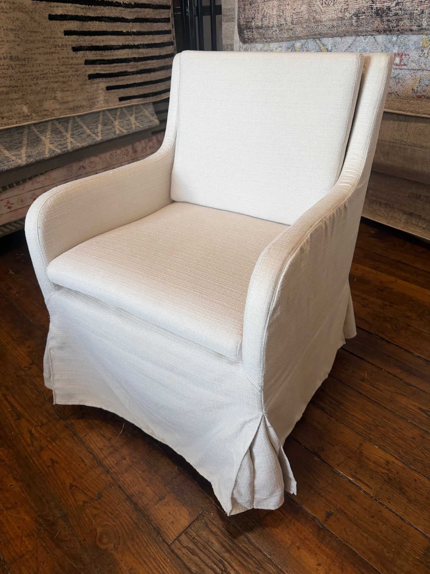 Upholstered cream linen chair on castors 🦋