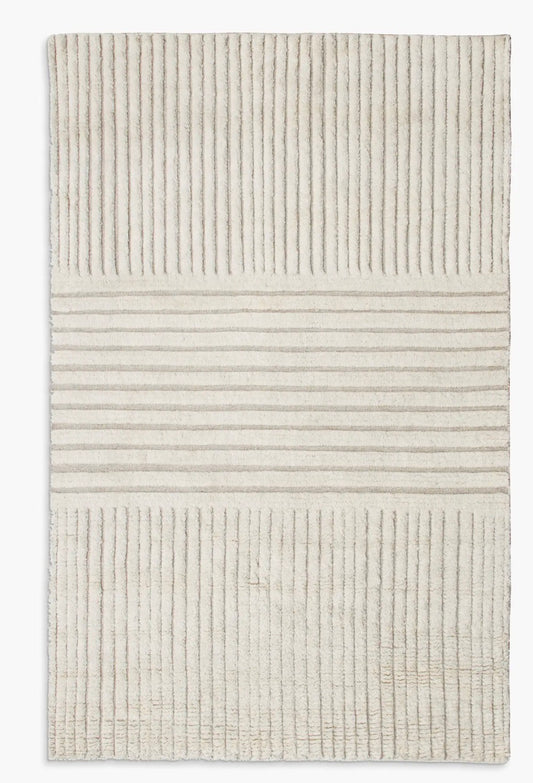 Hand-knotted wool rug