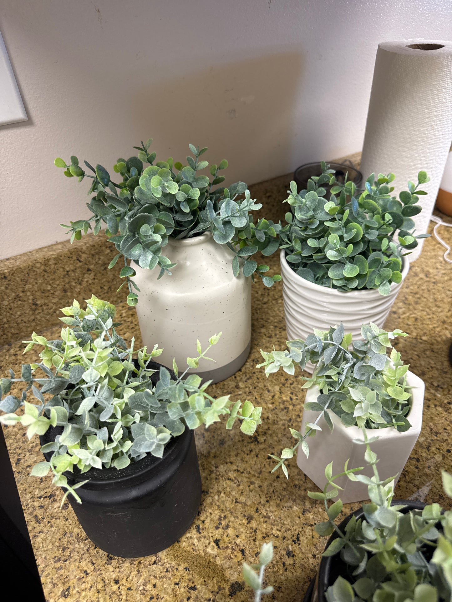 White & black ceramic pots with faux plants 🌿