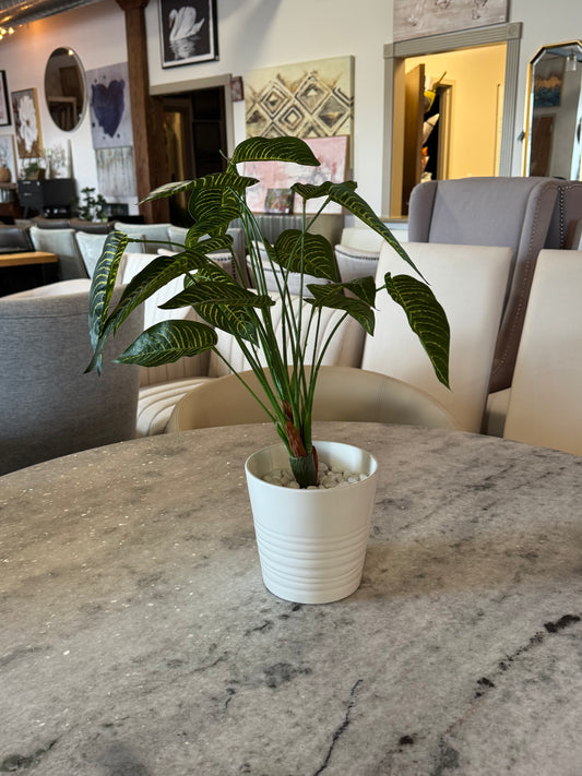 Faux plant in white planter 🌿
