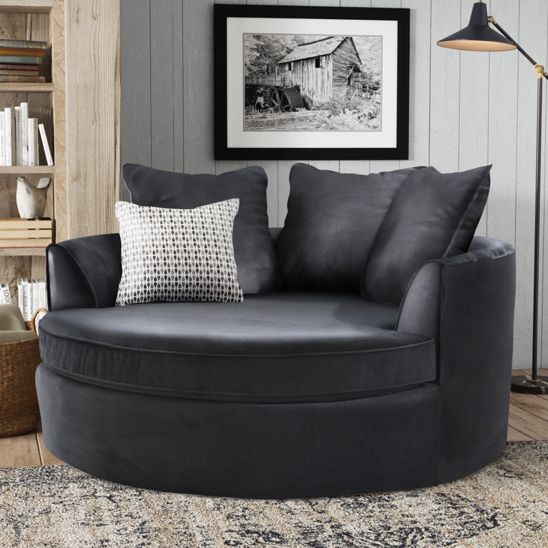 Black velvet barrel chair w/ pillows