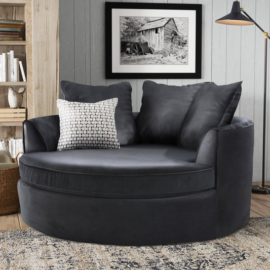 Black velvet barrel chair w/ pillows