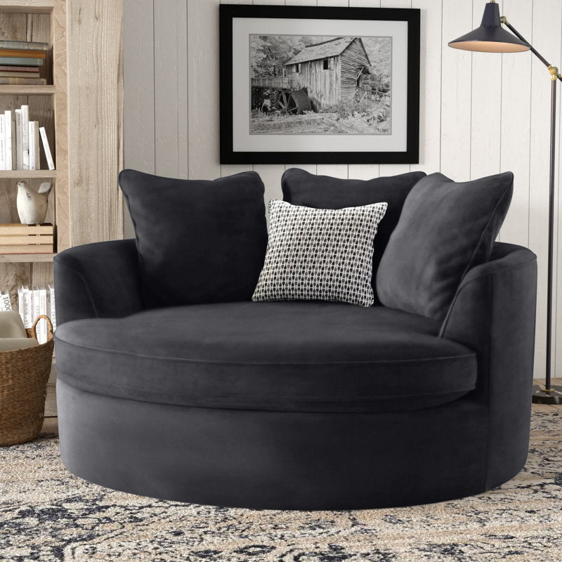 Black velvet barrel chair w/ pillows