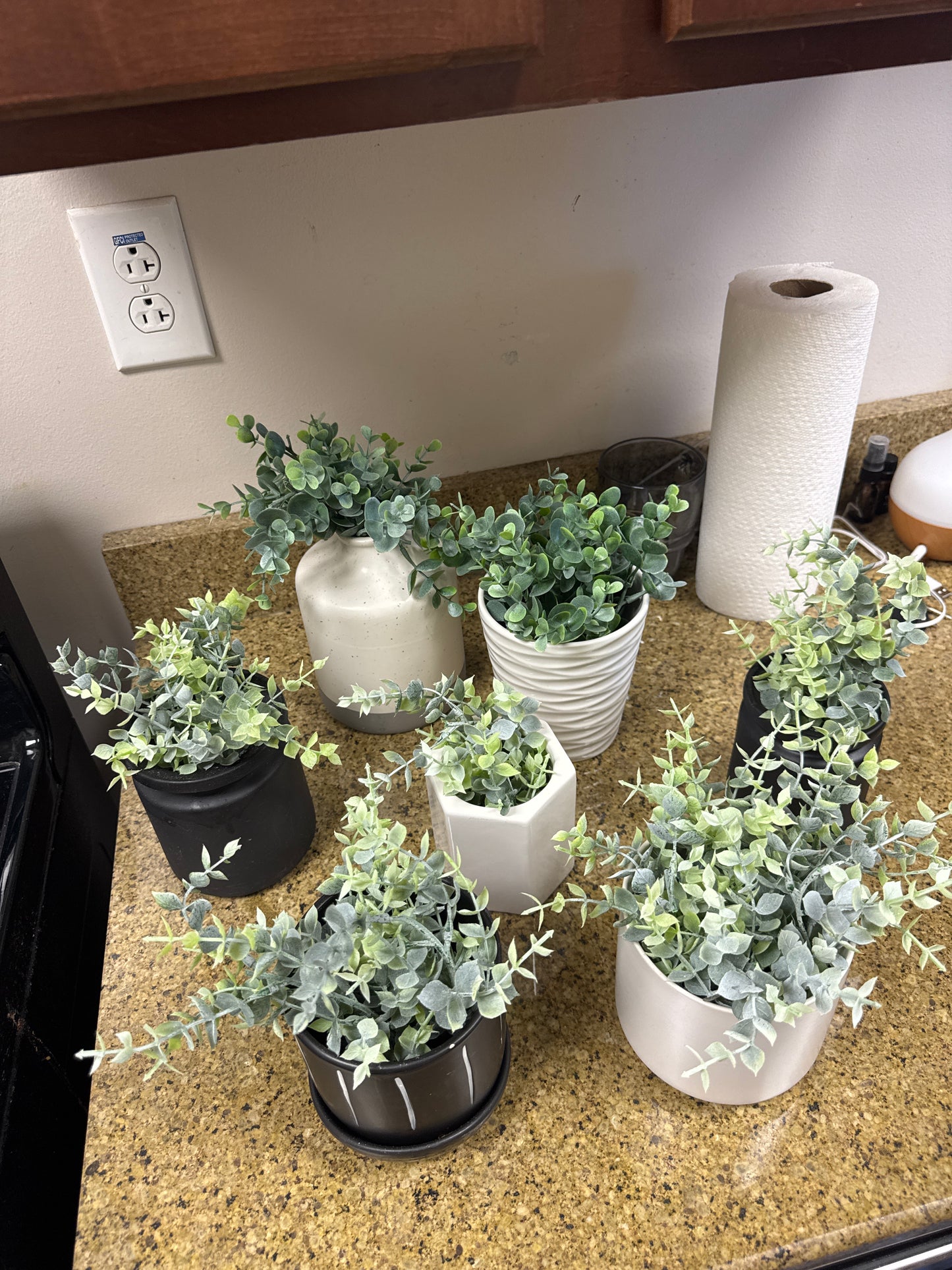 White & black ceramic pots with faux plants 🌿