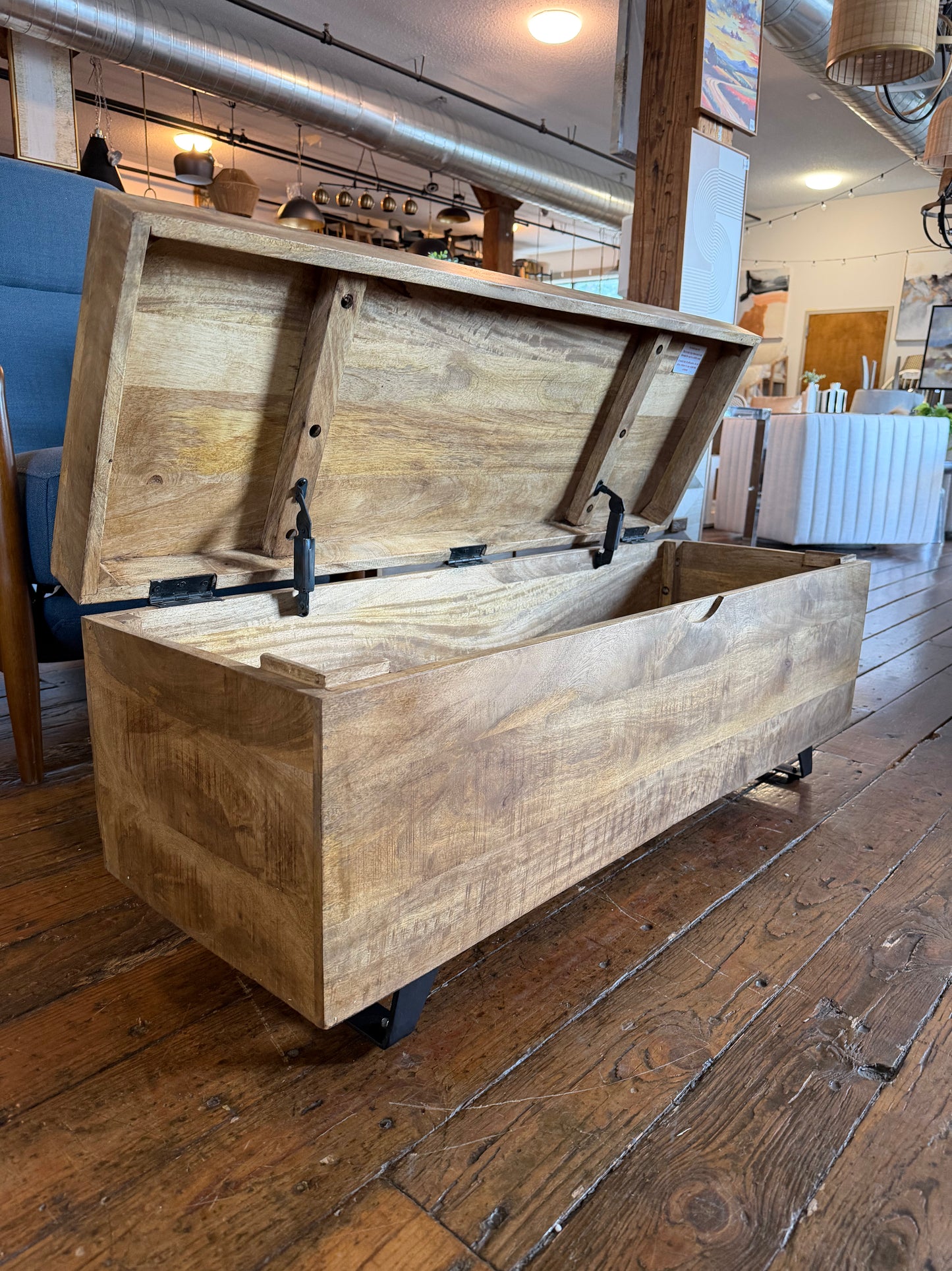 46" brown wood storage trunk w/ black metal legs