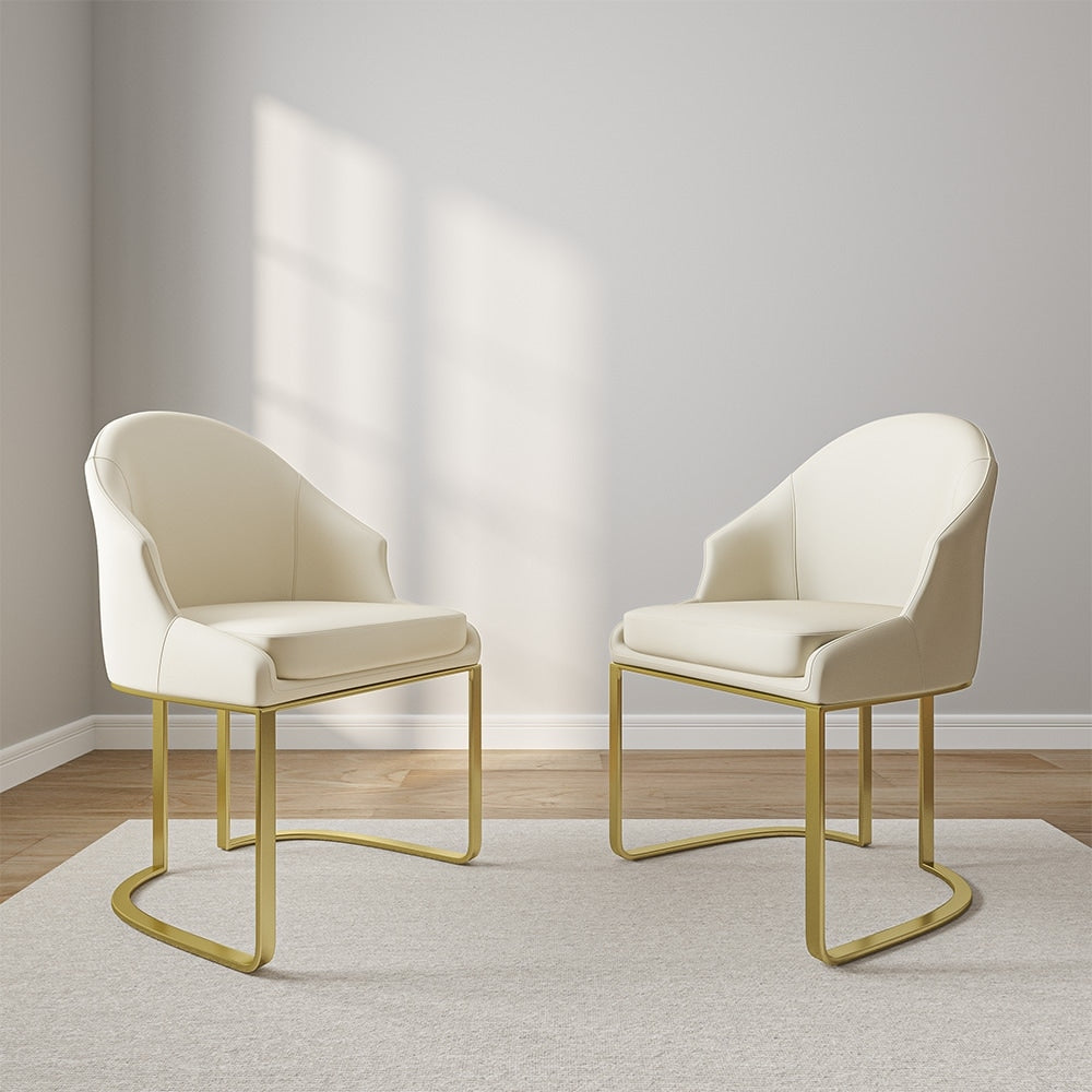 2 beige vegan leather & gold dining chairs
