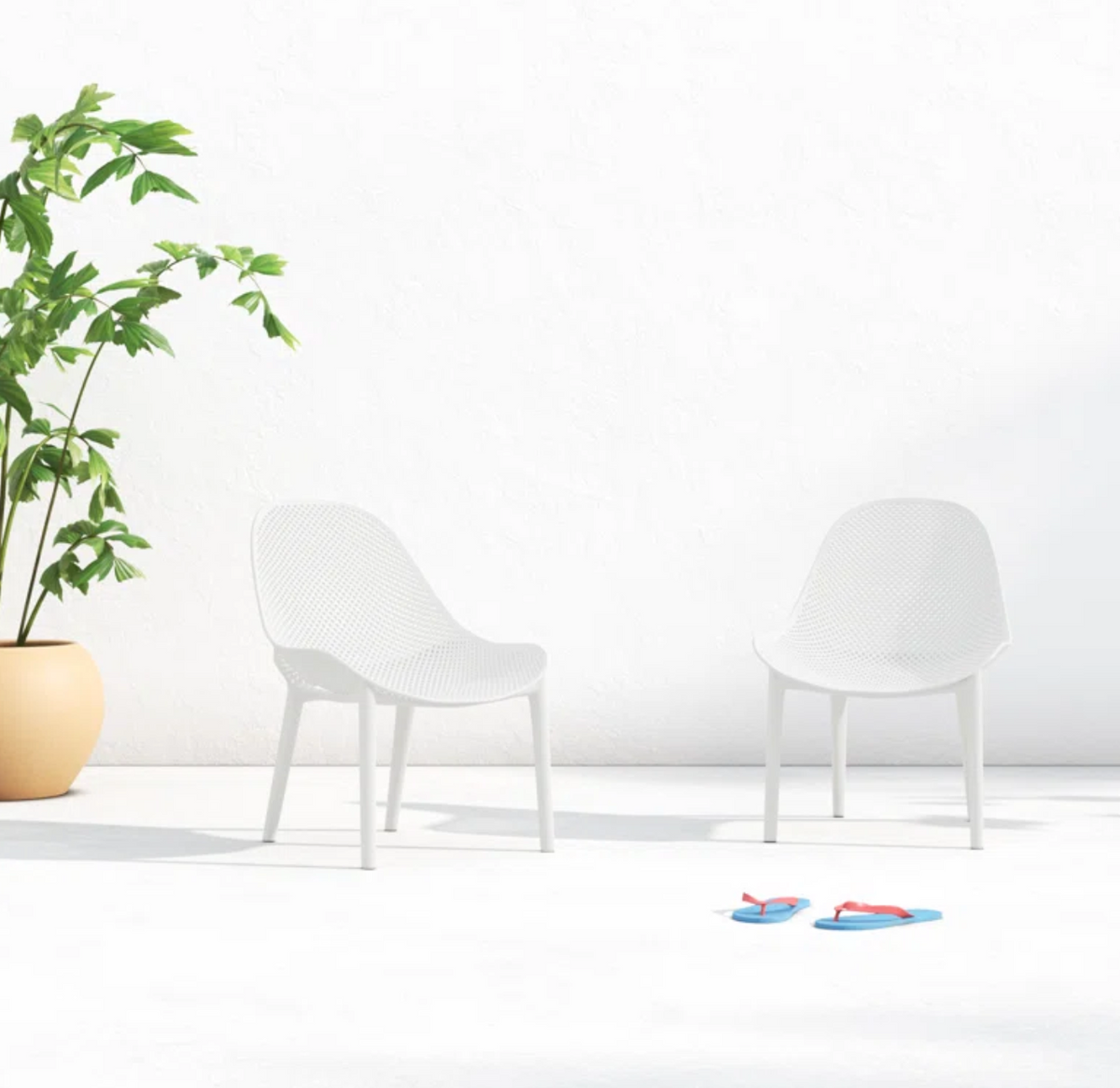 Stackable white outdoor chair 🤍