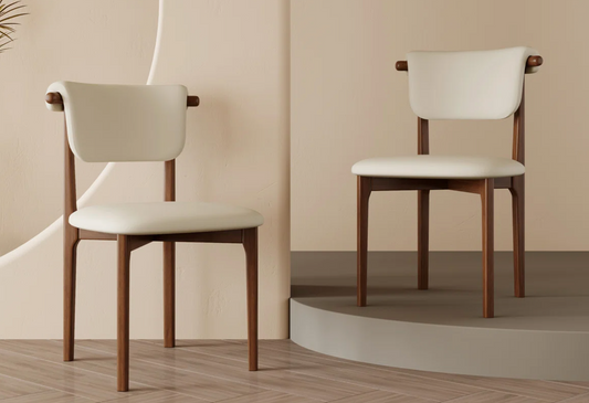 2 minimalist solid wood dining chairs w/ beige padded beige cushion 🪑