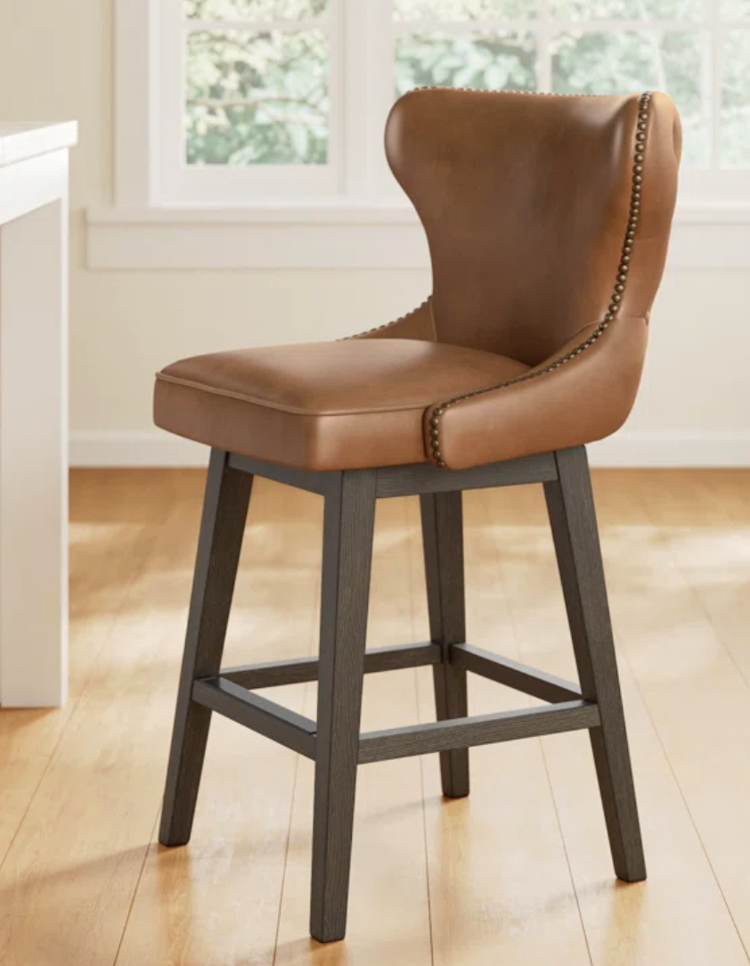 Brown faux leather swivel counterheight barstool🥃