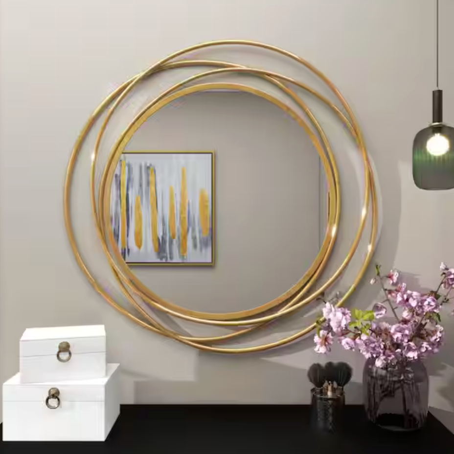 Gold metal 41" round wall mirror w/ overlapping circles 💫