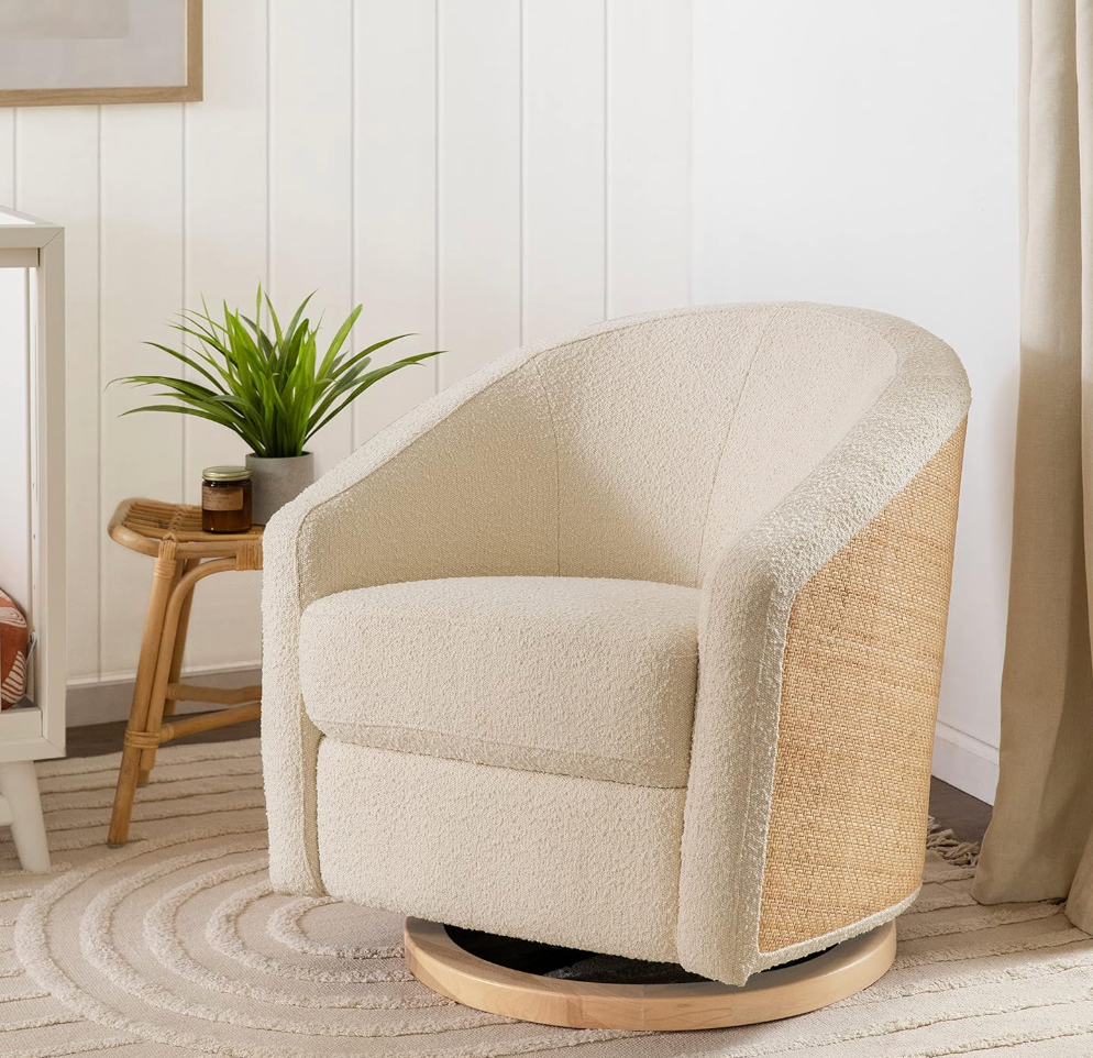 Babyletto swivel glider in ivory boucle w/ cane back & light wood base 🪴