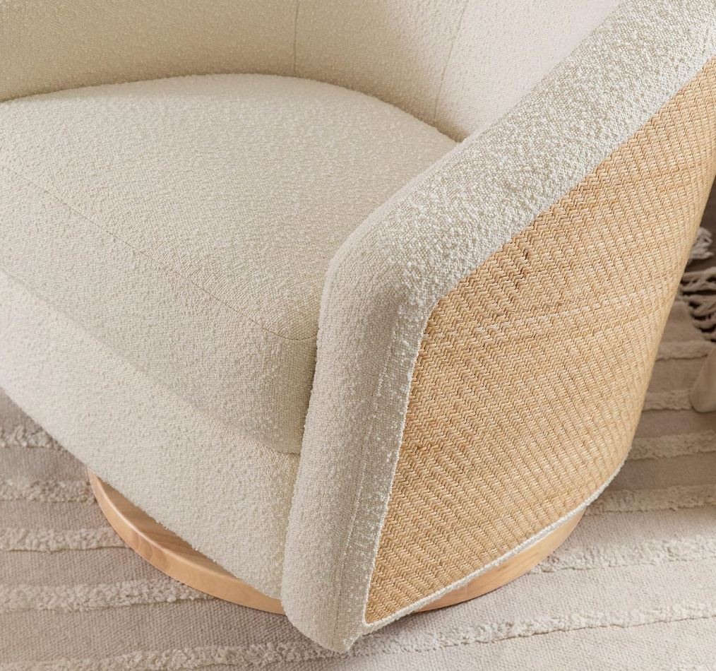 Babyletto swivel glider in ivory boucle w/ cane back & light wood base 🪴