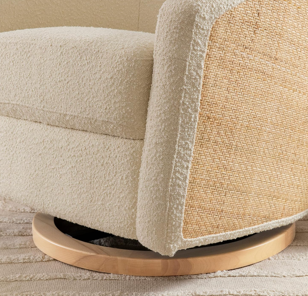 Babyletto swivel glider in ivory boucle w/ cane back & light wood base 🪴