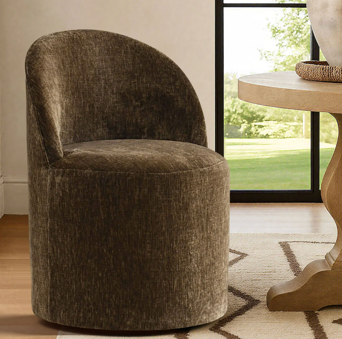 Brown chenille upholstered barrel chair with castors 🤎