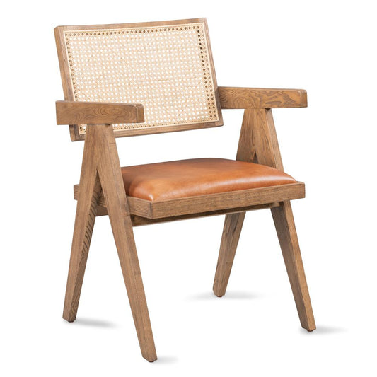 Tan leather armchair w/ cane rattan back