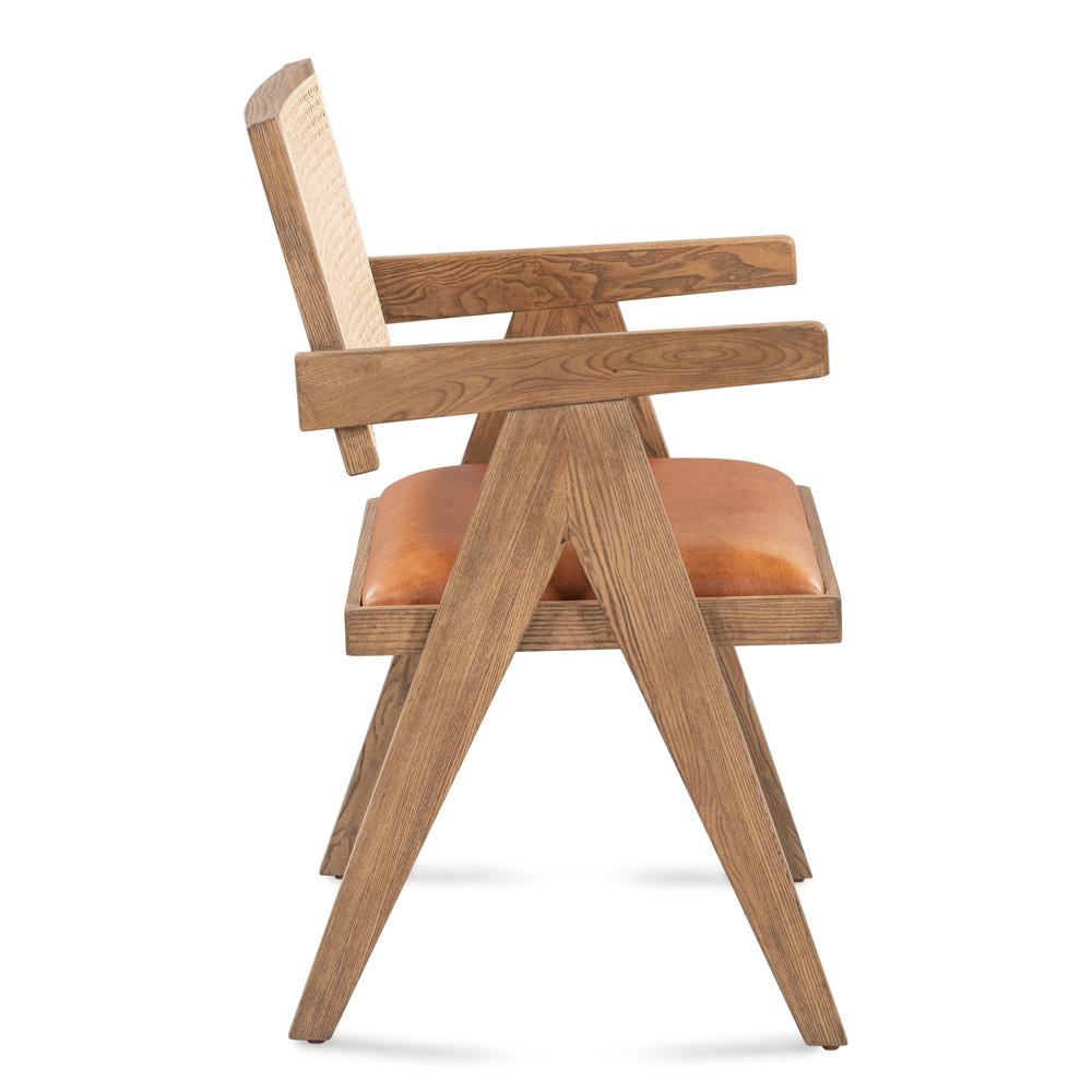 Tan leather armchair w/ cane rattan back