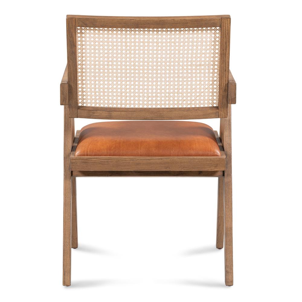 Tan leather armchair w/ cane rattan back